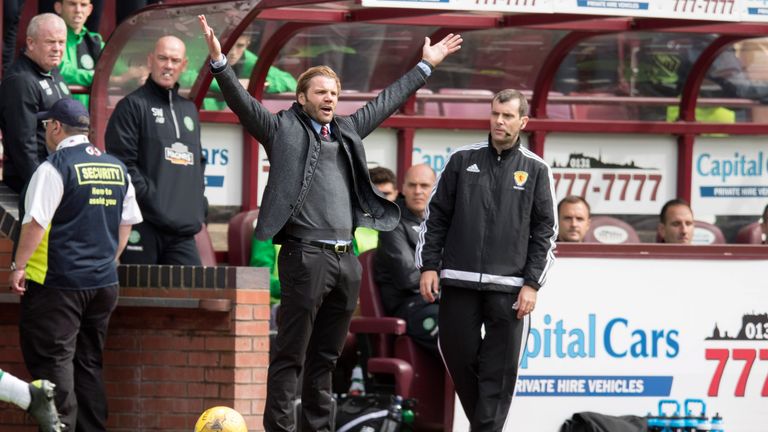 Hearts boss Robbie Neilson (arms aloft) during the Ladbrokes Scottish Premiership match against Celtic