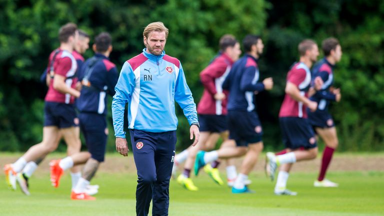 Hearts head coach Robbie Neilson has defended Jamie Walker 