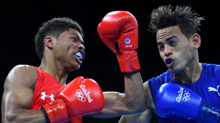USA's Shakur Stevenson (red) fights Cuba's Robeisy Ramirez (blue) during the Men's Bantam (56kg) Final Bout at the Rio 2016 Olympic Games at the Riocentro 