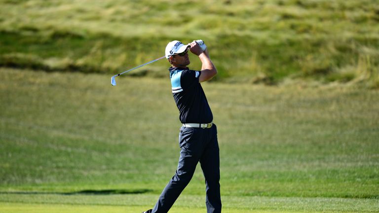 PRAGUE, CZECH REPUBLIC - AUGUST 18:  Robert Karlsson of Sweden takes his second shot on the 12th hole during day one of the D+D REAL Czech Masters at Albat