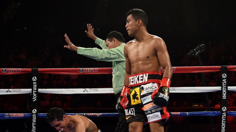 Boxer Roman Gonzalez (R) of Nicaragua knocks out Edgar Sosa of Mexico on May 16, 2015.  