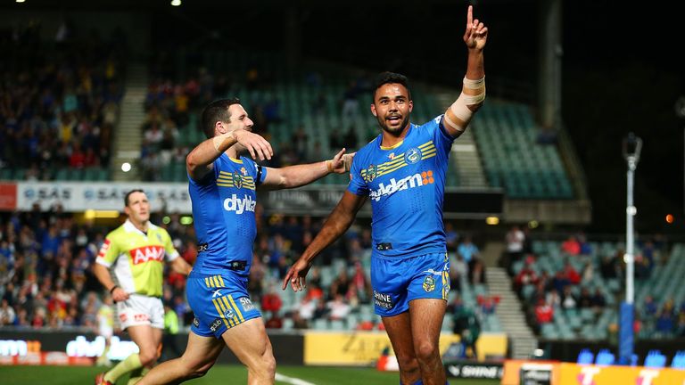 Bevan French (right) celebrates scoring a try against St George