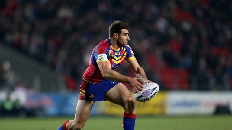 ST HELENS, ENGLAND - FEBRUARY 06:  Thomas Bosc of Catalans Dragons spins the ball out during the First Utility Super League match between St Helens and Cat