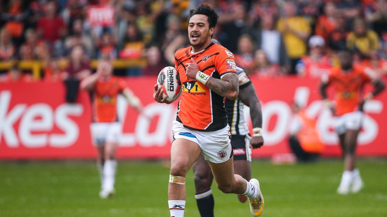 Castleford's Denny Solomona runs in for a try against Salford
