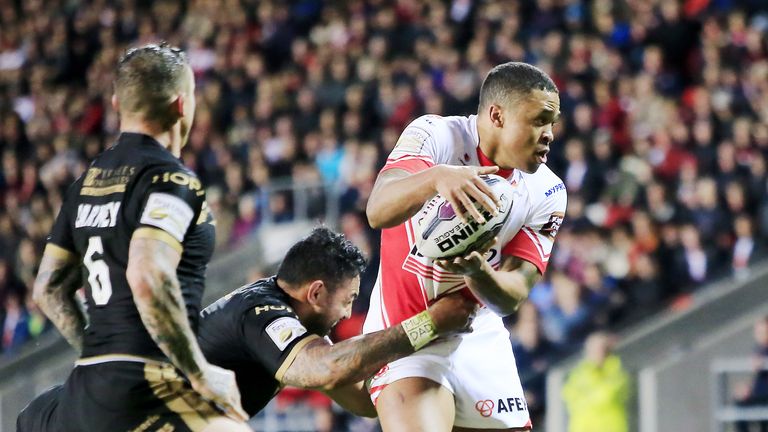 Jordan Turner tackled by Catalans' Krisnan Inu