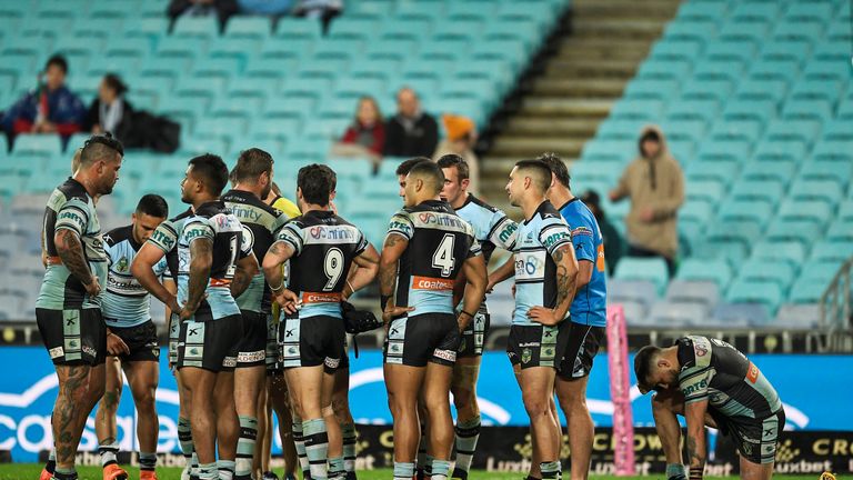 Sharks players show their dejection during the round 24 NRL match between the South Sydney Rabbitohs and the Cronulla Sharks