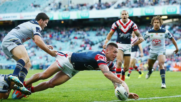 Shaun Kenny-Dowall scores a try against the Cowboys