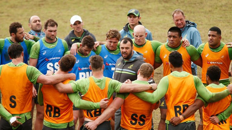 Wallabies coach Michael Cheika speaks to his players during a training session