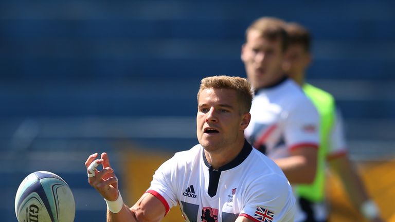 Tom Mitchell passes the ball during a Great Britain Rugby 7's training session