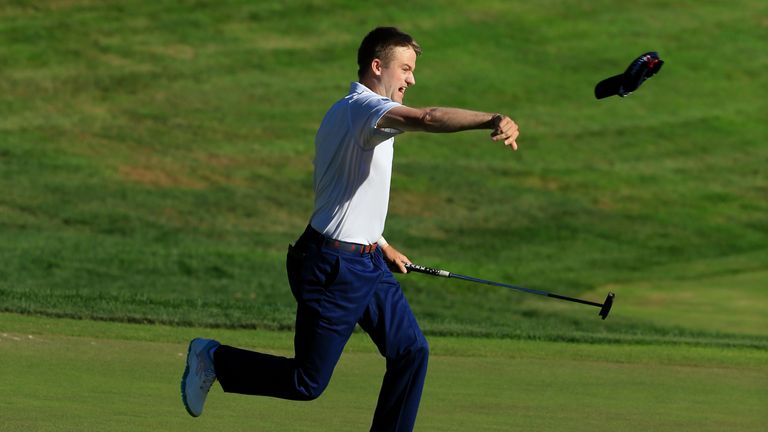Russell Knox flings his hat away after holing the winning putt at TPC River Highlands