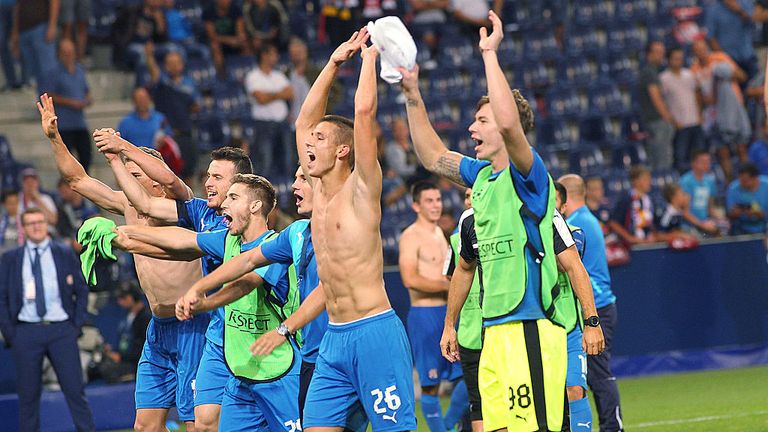 Zagreb's players celebrate during the UEFA Champions League Qualification Play-offs match Red Bull Salzburg vs Dinamo Zagreb