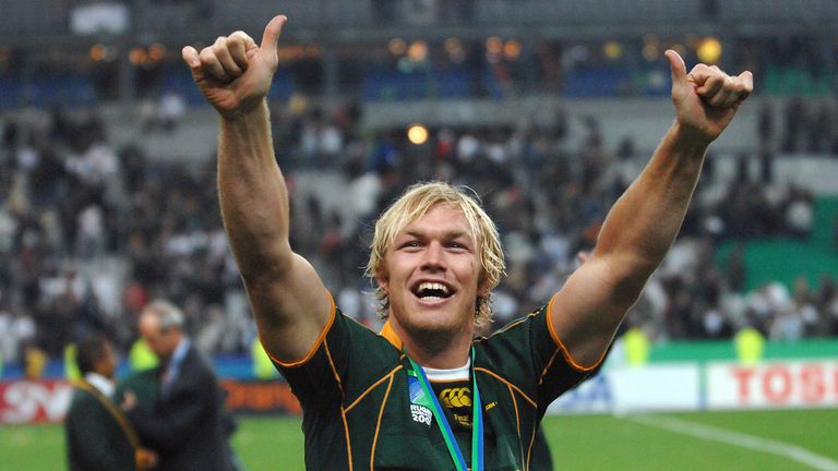 South Africa's flanker Schalk Burger salutes the audience after winning the rugby union World Cup final match against England, 20 October 2007 at the Stade