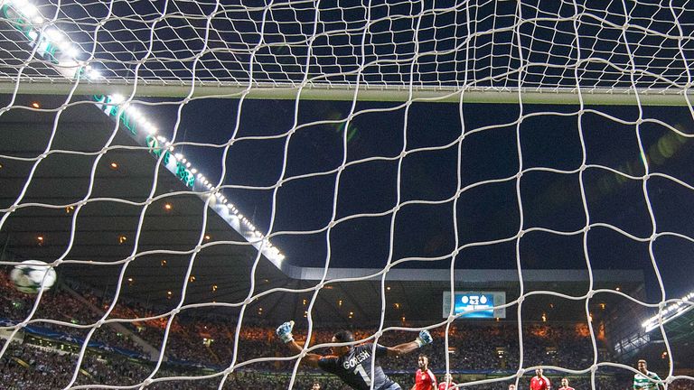 A late strike by Scott Brown (centre) has given Celtic a three-goal advatage