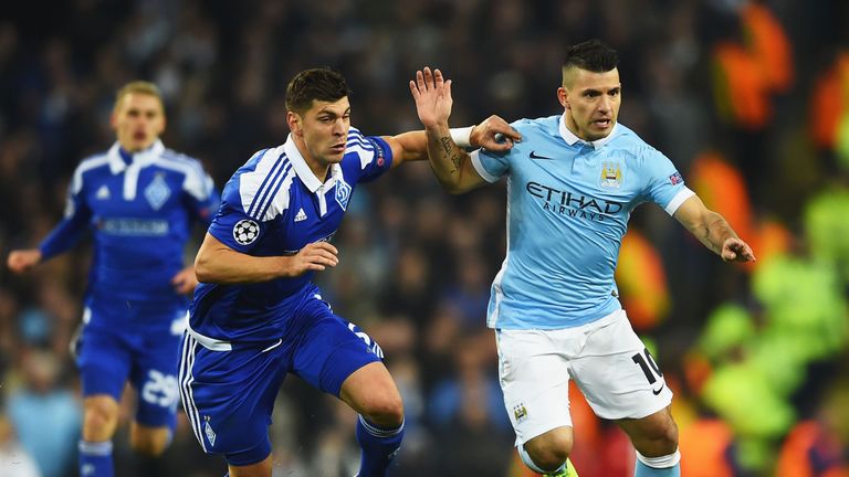 MANCHESTER, ENGLAND - MARCH 15:  Sergio Aguero of Manchester City holds off Aleksandar Dragovic of Dynamo Kiev during the UEFA Champions League round of 16