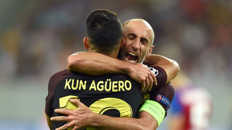 Sergio Aguero (front) celebrates with teammate Pablo Zabaleta