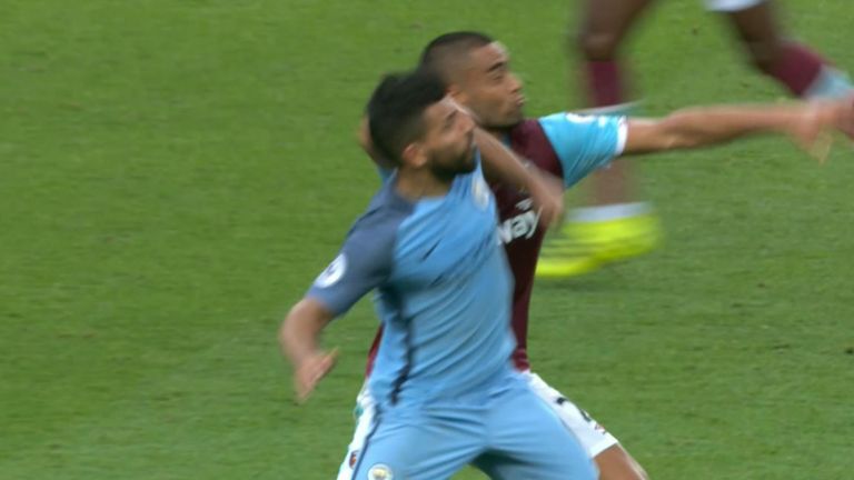 Sergio Aguero clashes with Winston Reid during Manchester City's 3-1 victory over West Ham