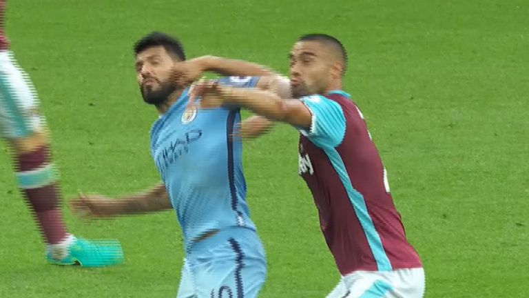 Sergio Aguero clashes with Winston Reid during Manchester City's 3-1 victory over West Ham