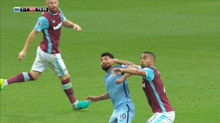 Sergio Aguero clashes with Winston Reid during Manchester City's 3-1 win over West Ham