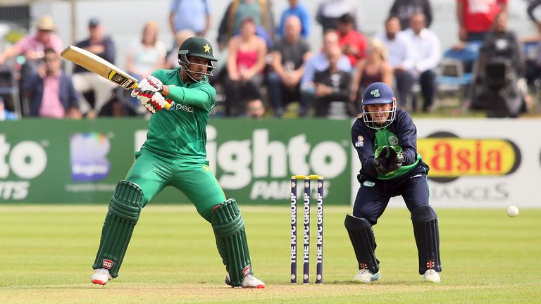 Pakistan's Sharjeel Khan (L) plays a shot on the way to scoring a century (100 runs) during the first ODI against Ireland