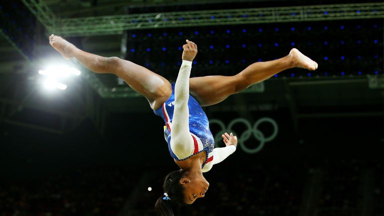 RIO DE JANEIRO, BRAZIL - AUGUST 11:  Simone Biles of the United States competes on the balance beam during the Women's Individual All Around Final on Day 6