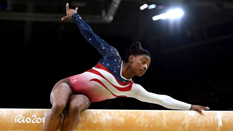 RIO DE JANEIRO, BRAZIL - AUGUST 09:  Simone Biles of the United States competes on the balance beam during the Artistic Gymnastics Women's Team Final on Da