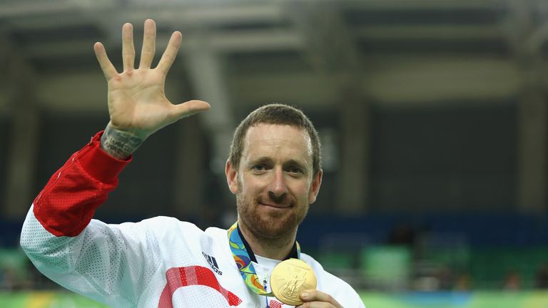 RIO DE JANEIRO, BRAZIL - AUGUST 12:  Gold medalist Bradley Wiggins of Team Great Britain poses for photographs with his fifth gold medal in his career afte