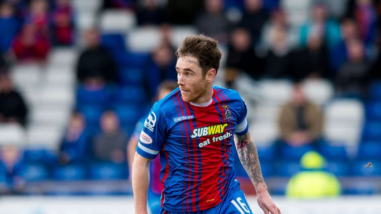 Inverness CT's Greg Tansey runs with the ball.