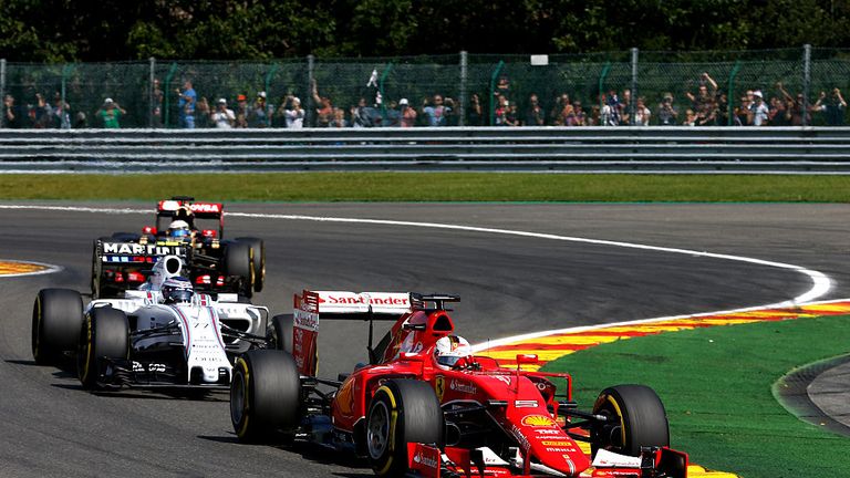 Sebastian Vettel of Germany and Ferrari drives during the Formula One Grand Prix of Belgium at Circuit de Spa-Francorchamps