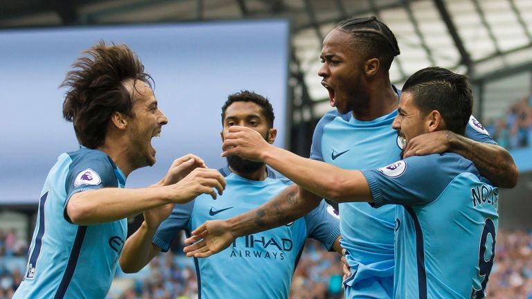 Raheem Sterling celebrates scoring Manchester City's first goal against West Ham in the Premier League.