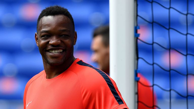 France's goalkeeper Steve Mandanda smiles during a training session at the Parc Olympique Stadium in Lyon, on June 25, 2016 on the eve of the Euro 2016 foo