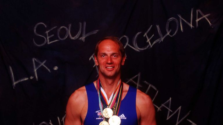 Steve Redgrave poses with his five gold medals from five different Olympics