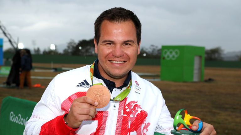 Great Britain's Steven Scott with his bronze medal during the men's double trap bronze medal match at the Olympic Shooting Centre on the fifth day in Rio