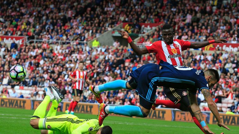 Sunderland's Italian goalkeeper Vito Mannone (L) comes out to save from Middlesbrough's Spanish striker Alvaro Negredo