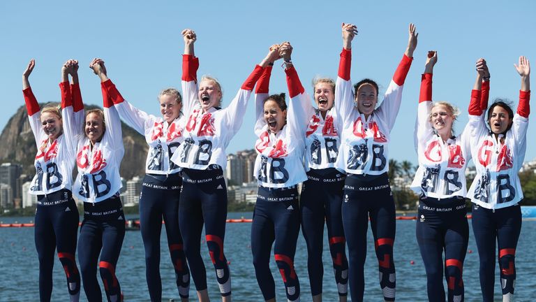 Silver medalists Great Britain celebrate after the women's eight