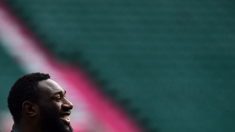 South Africa's prop Tendai Mtawarira smiles during the captain's run at Twickenham Stadium,