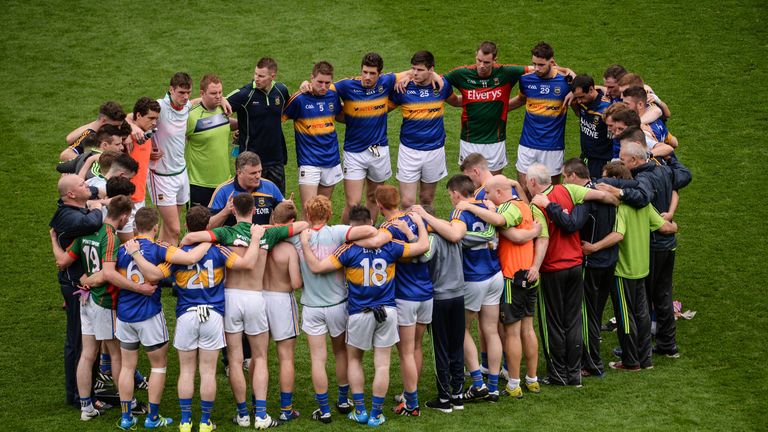 Tipperary manager Liam Kearns in a huddle with his players after the game.