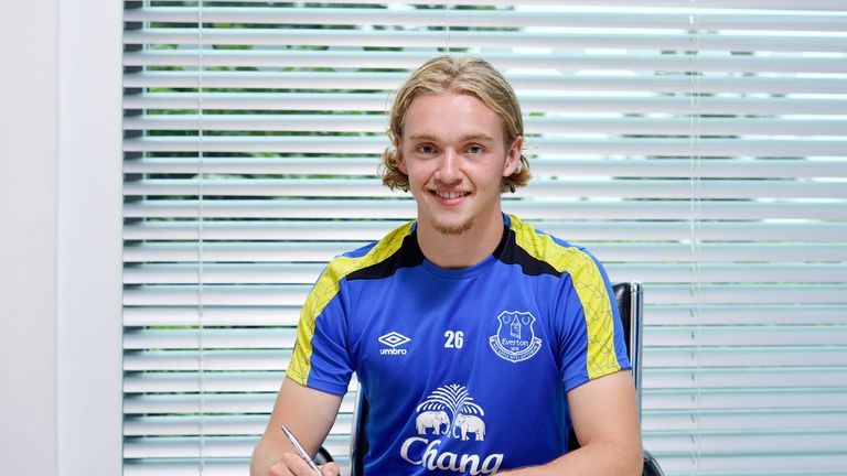 Tom Davies of Everton poses for a photo as he signs a new contract at Finch Farm on August 2, 2016 in Ha