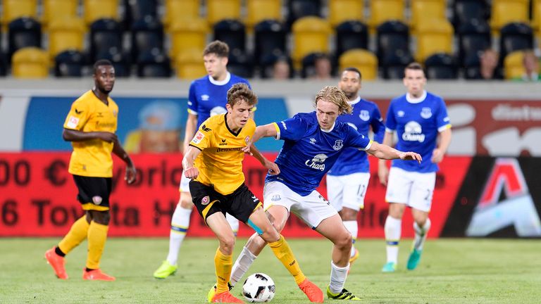 DRESDEN, GERMANY - JULY 29: Tom Davies of Everton challenges Niklas Hauptmann challenges during the Dresden Cup match between Dynamo Dresden and Everton on