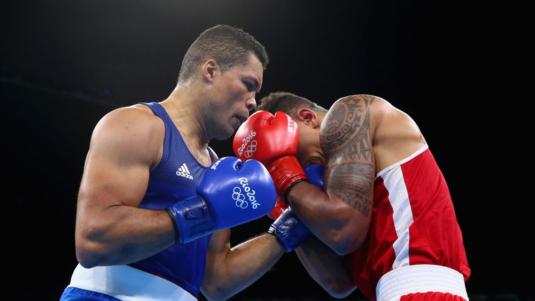 RIO DE JANEIRO, BRAZIL - AUGUST 21:  Tony Victor James Yoka of France and Joe Joyce of Great Britain compete during the Men's Super Heavy (+91kg) Final Bou