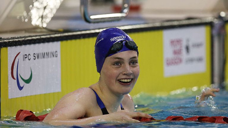 Tully Kearney celebrates becoming 100m butterfly world champion