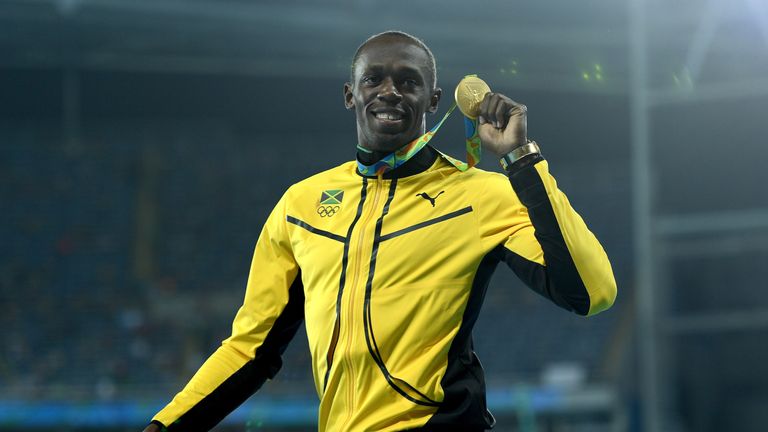 RIO DE JANEIRO, BRAZIL - AUGUST 19:  Gold medalist, Usain Bolt of Jamaica, poses on the podium during the medal ceremony for the Mens 200m on Day 14 of t