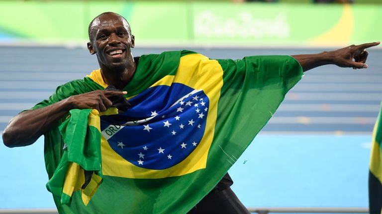 Jamaica's Usain Bolt celebrates his team's victory at the end of the Men's 4x100m Relay Final during the athletics event at the Rio 2016 Olympic Games at t