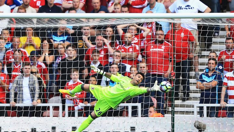 MIDDLESBROUGH, ENGLAND - AUGUST 13: Victor Valdes of Middlesbrough fails to stop Xherdan Shaqiri of Stoke City shot from going in during the Premier League