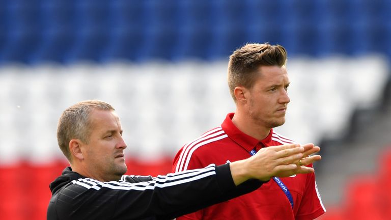 PARIS, FRANCE - JUNE 24:  Wales goalkeeper Wayne Hennessey (r) chats with coach Martyn Margetson during Wales Open Session prior to their Euro 2016 match a