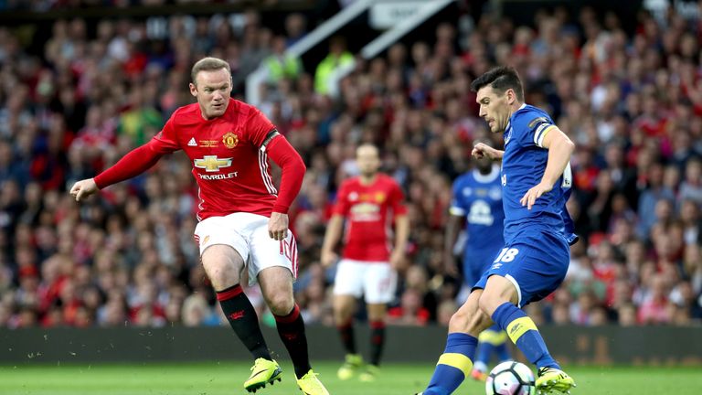 Everton's Gareth Barry (right) attempts to block Manchester United's Wayne Rooney during Wayne Rooney's Testimonial at Old Trafford, Manchester.