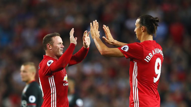 MANCHESTER, ENGLAND - AUGUST 19:  Zlatan Ibrahimovic of Manchester United celebrates scoring the opening goal with Wayne Rooney of Manchester United during