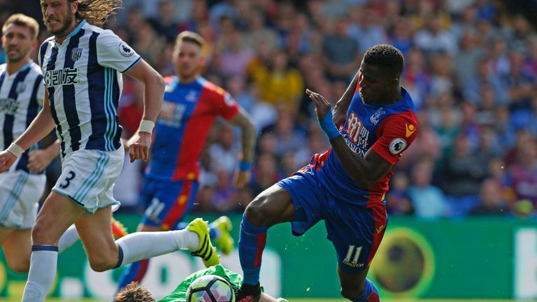 Crystal Palace striker Wilfried Zaha has his attempt on goal saved by Ben Foster