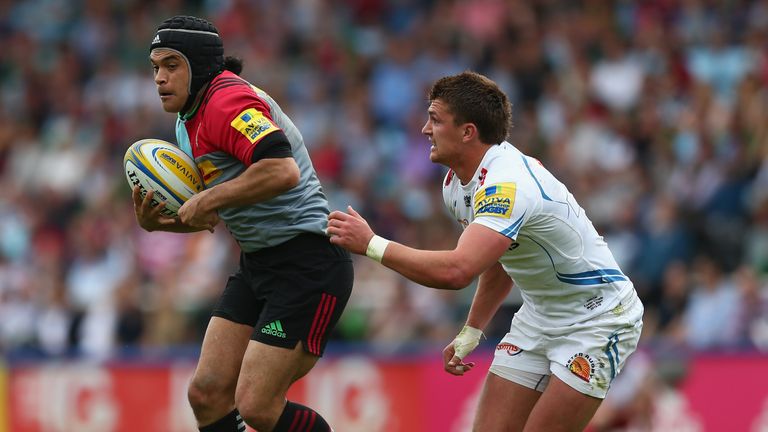 Winston Stanley of Harlequins breaks away from Henry Slade of Exeter Chiefs 