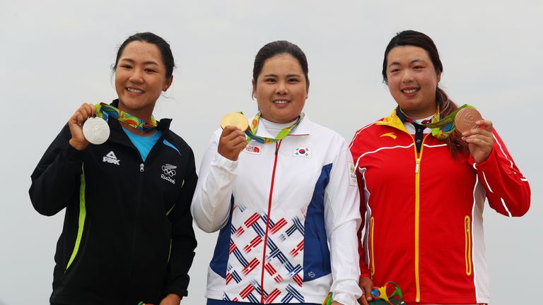 (L-R) Lydia Ko of New Zealand, Inbee Park of Korea and Shanshan Feng of China after the women's Olympic golf