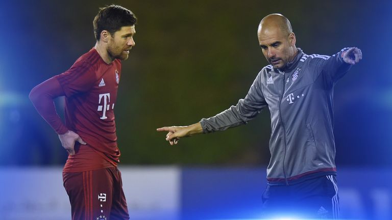 Xabi Alonso and Pep Guardiola discuss tactics at Bayern Munich